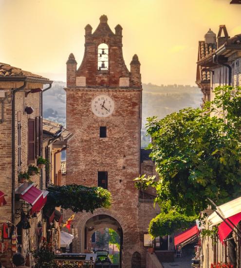 Medieval clock tower in a picturesque Italian village.